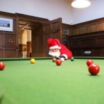Santa plays snooker