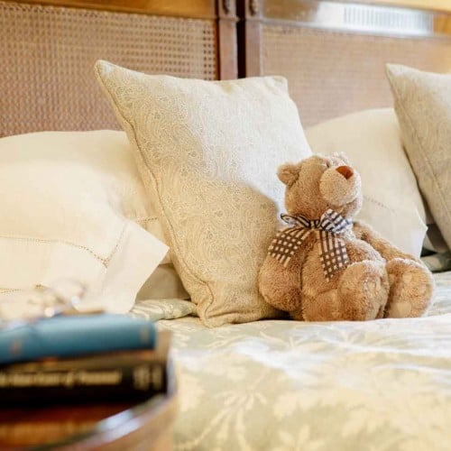 Spring bedroom with teddy